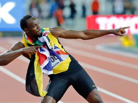 LONDON, ENGLAND - AUGUST 05: Usain Bolt of Jamaica having run his last 100m race, stands with both the Jamaican and Union Jack flag around his neck and pulls into his famous lighting bolt pose during day two of the 16th IAAF World Athletics Championships London 2017 at The London Stadium on August 5, 2017 in London, United Kingdom. (Photo by Paul Cunningham - Corbis/Corbis via Getty Images)